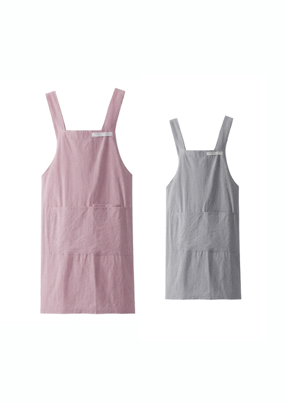 ピンクとグレーの親子エプロンを並べた商品画像。大人用と子ども用のカラー違いを比較