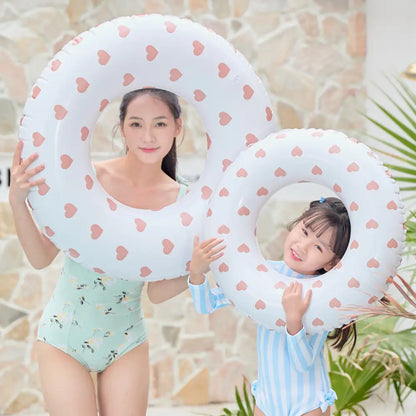 浮き輪　レトロデザイン浮き輪　SNS映えプールグッズ　家族お揃い浮き輪　くすみカラー夏アイテム　コンパクト収納浮き輪　ベビーキッズ大人兼用浮き輪　おしゃれビーチグッズ　アームリングセット浮き輪　夏レジャー必需品